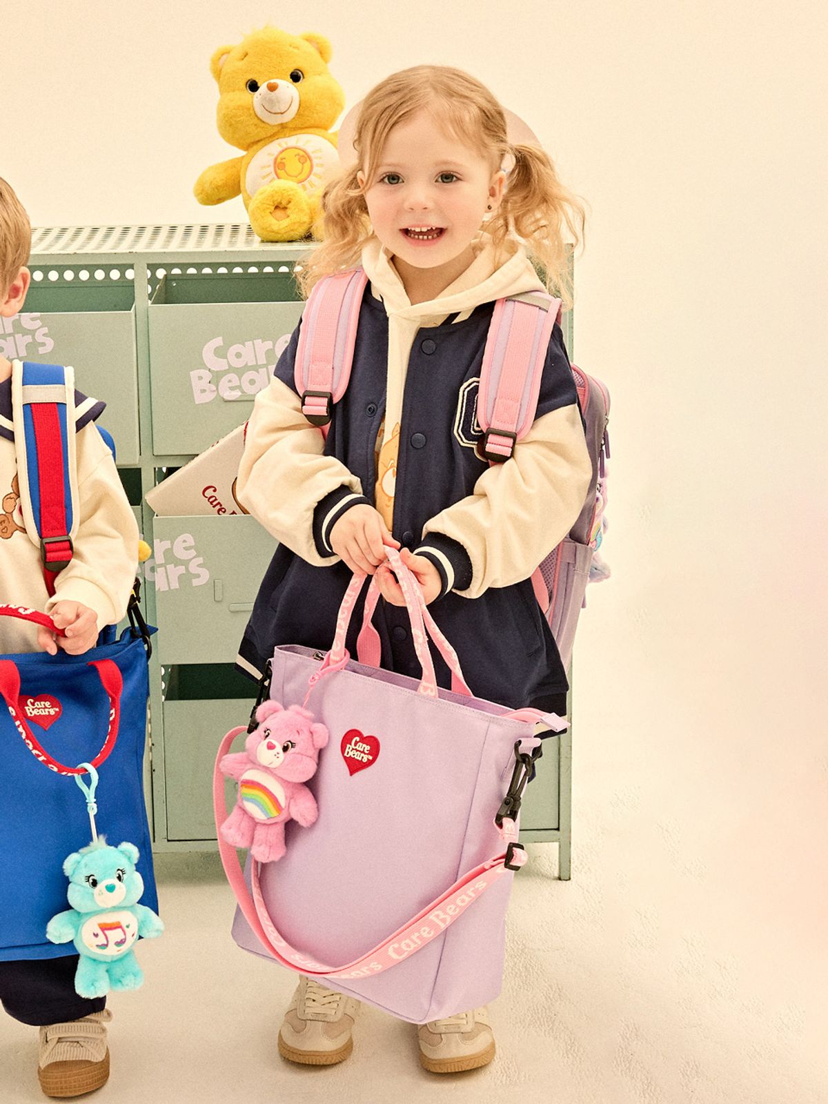 케어베어(CAREBEARS) 하트로고 데일리 신주머니 보조가방