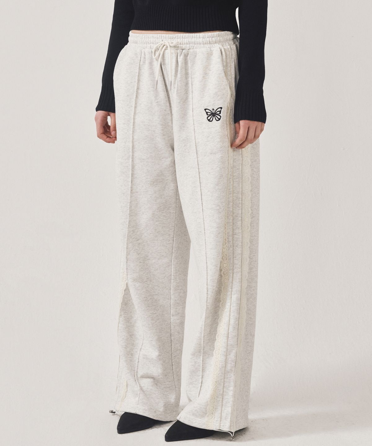 닉앤니콜(NICK&NICOLE) BUTTERFLY LACE SWEAT PANTS_MELANGE