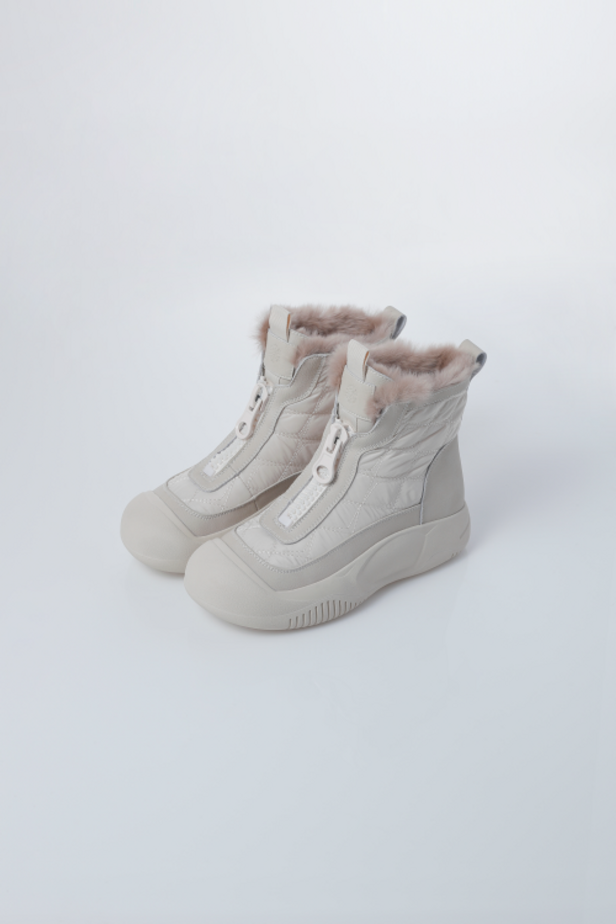 에코에(ECOE) e.c.o.e Nordic Quilted Boots