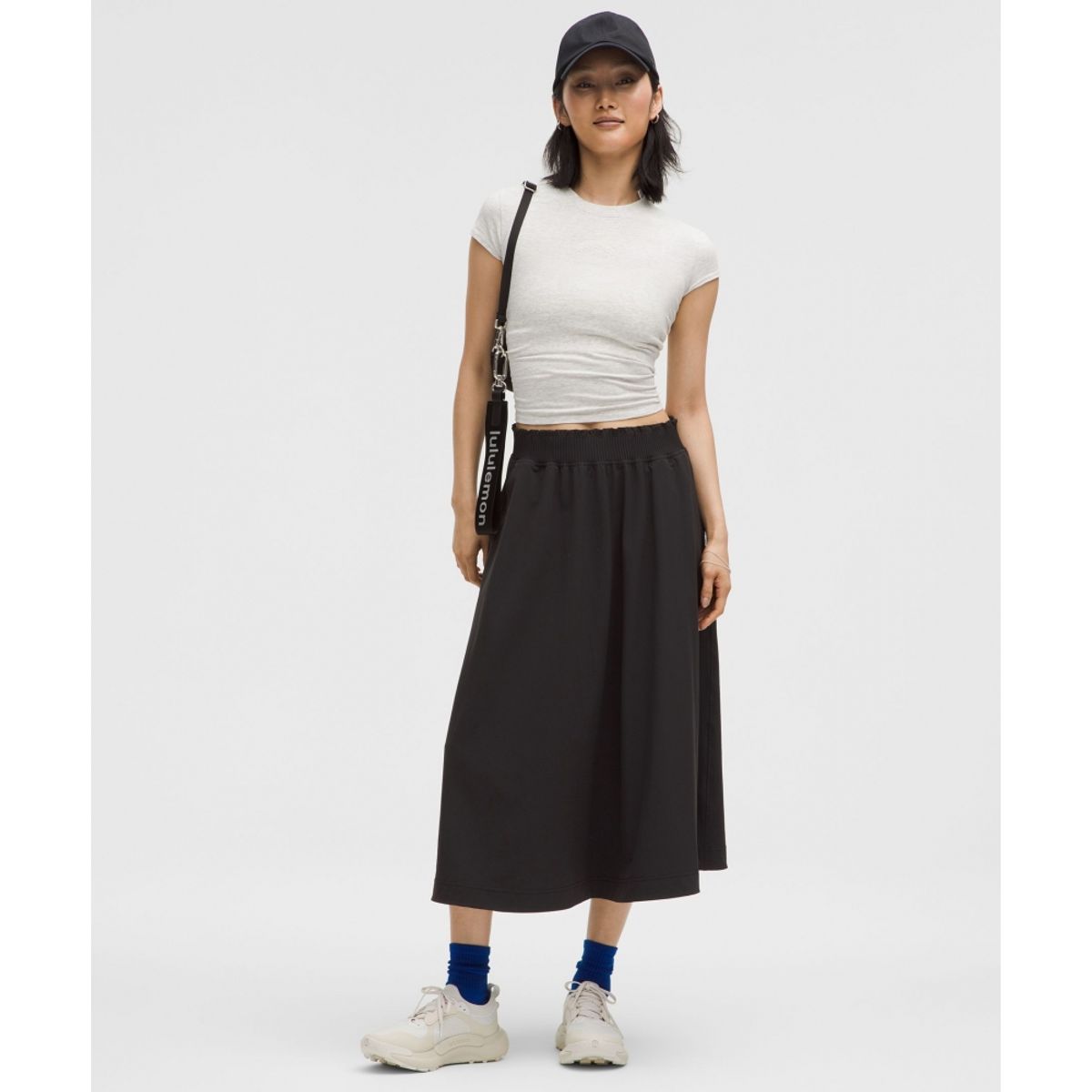 룰루레몬(LULULEMON) 스트레치 우븐 러플 웨이스트 미디스커트  BLK
