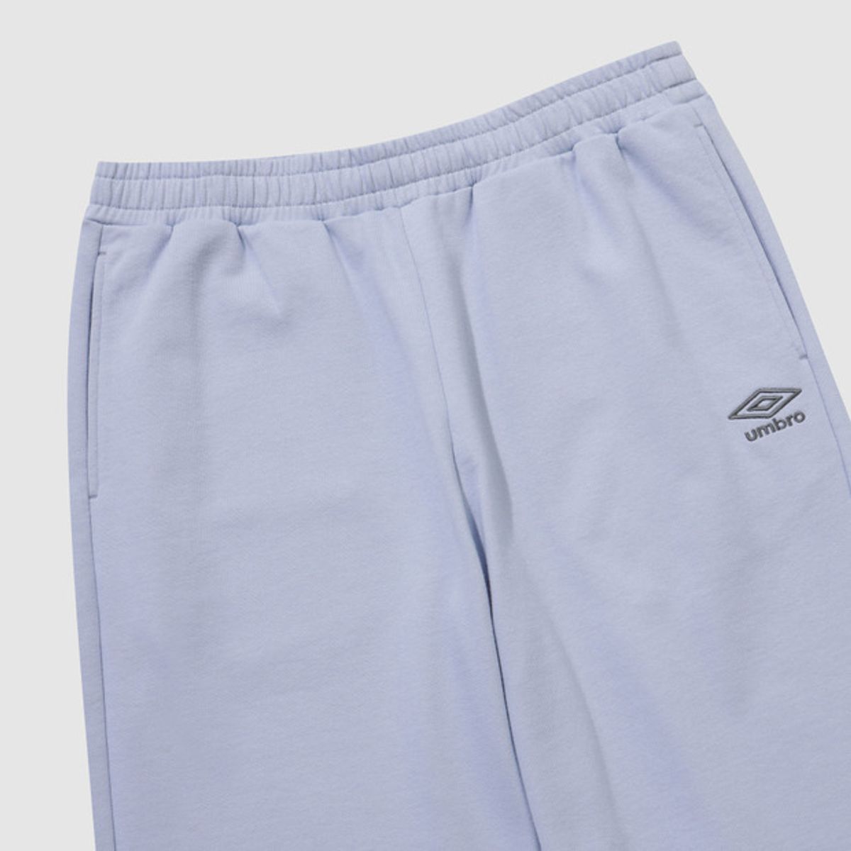 엄브로(UMBRO) 에센셜 루즈 조거 팬츠 스카이블루 UR123CFP19