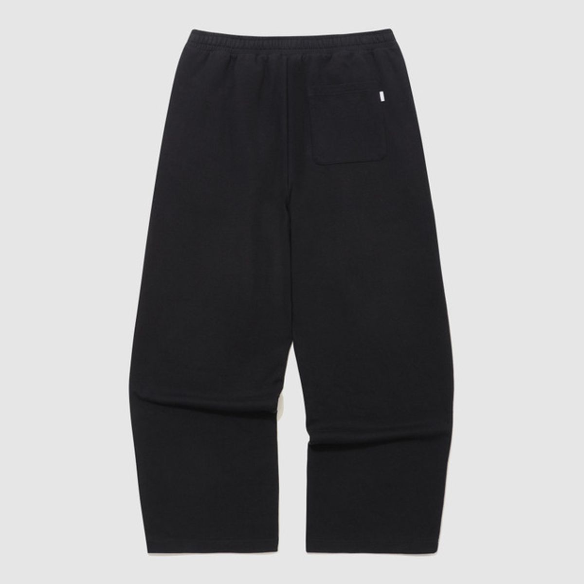 엄브로(UMBRO) 에센셜 루즈 와이드 팬츠 블랙 UR123CFP17