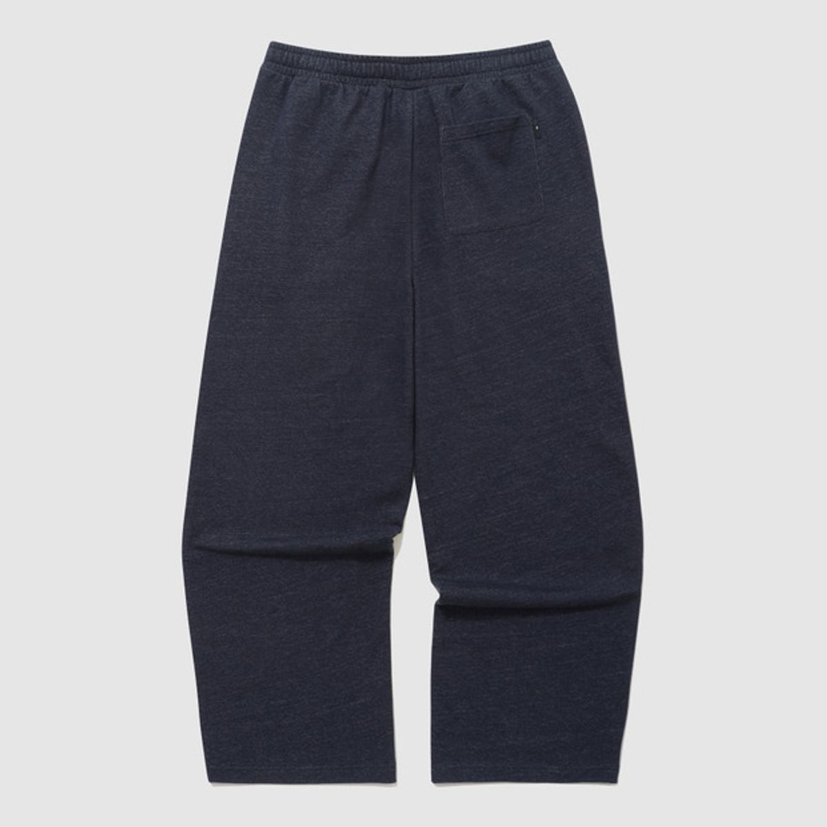 엄브로(UMBRO) 에센셜 루즈 와이드 팬츠 네이비 UR123CFP17