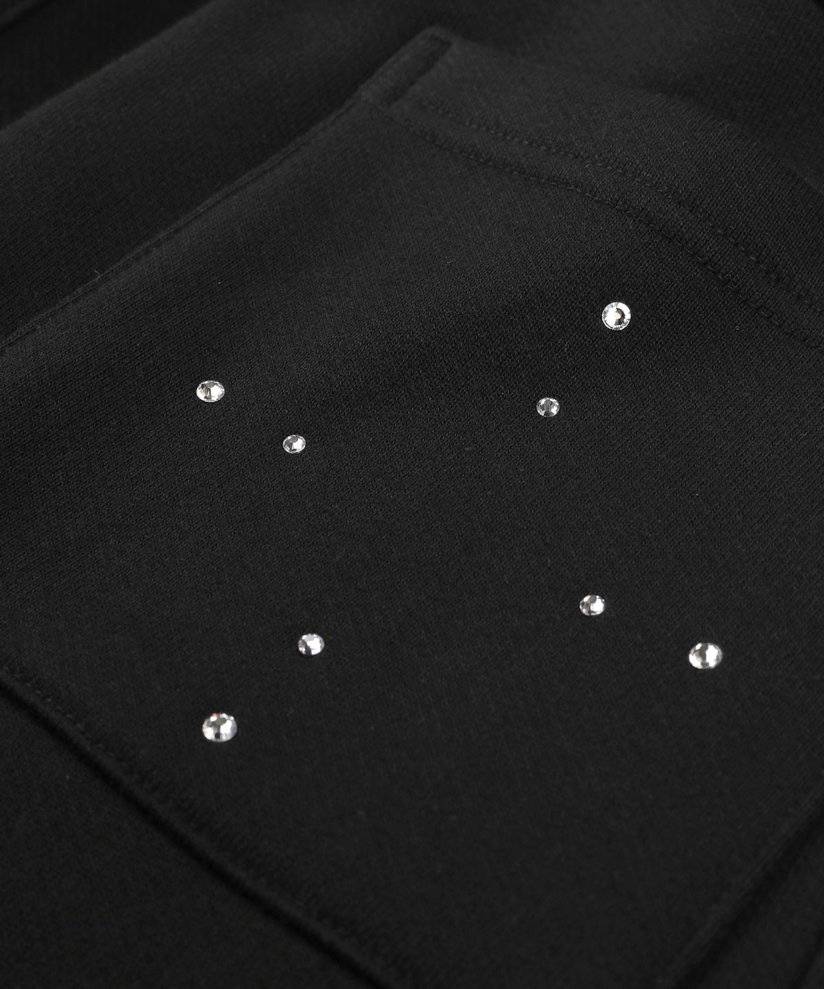 언노운컴노멀(UNKNOWNCOMENORMAL) Symbol Crystal Sweat Pants [BLACK]
