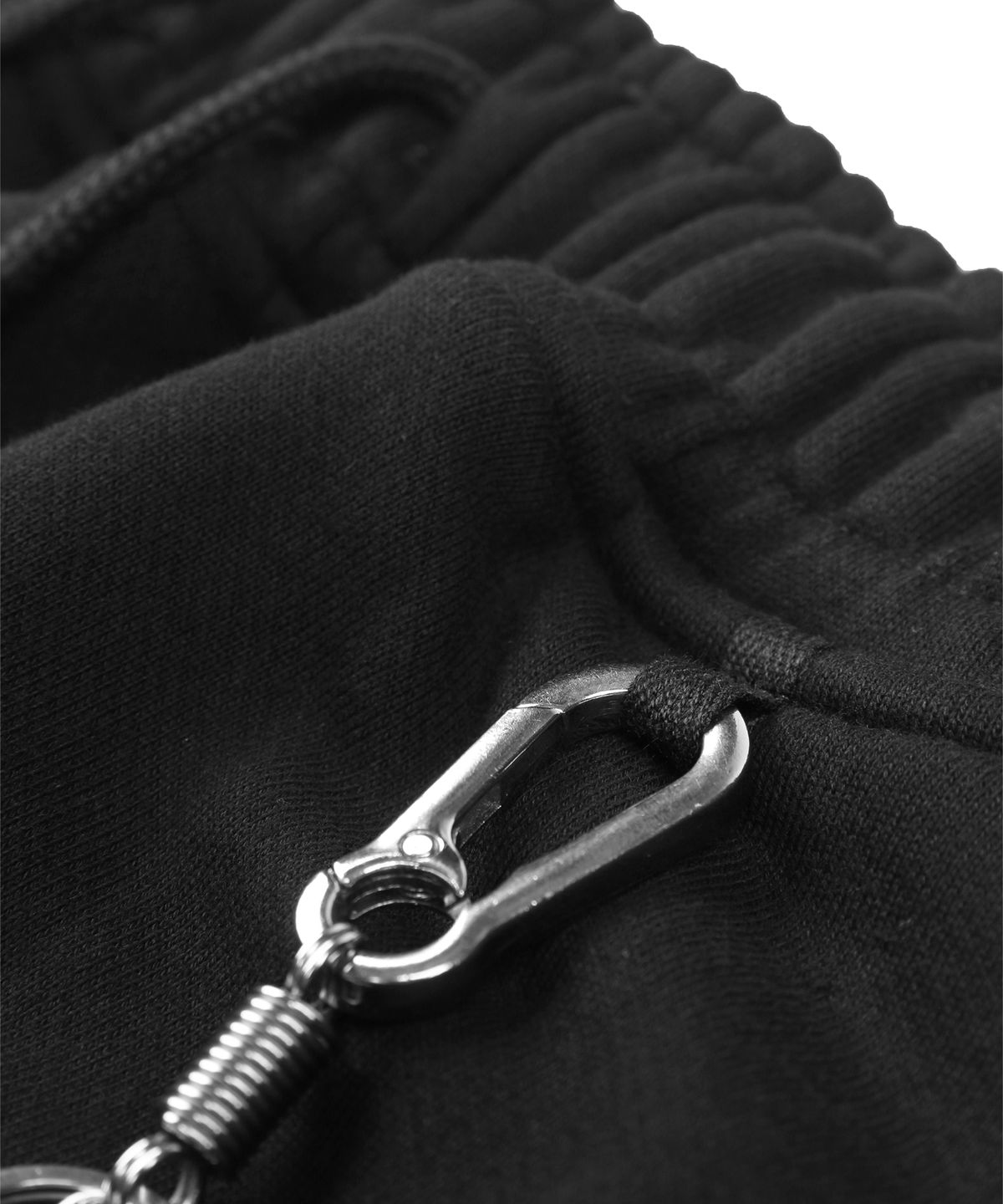 언노운컴노멀(UNKNOWNCOMENORMAL) Symbol Crystal Sweat Pants [BLACK]