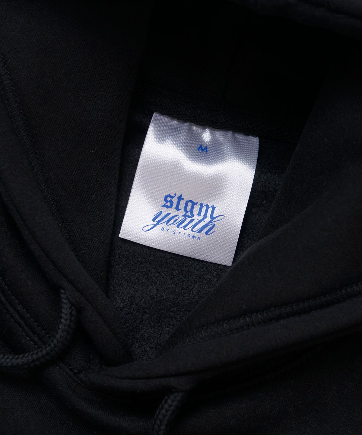 스티그마(STIGMA) [STGM youth] TAG HOODIE BLK