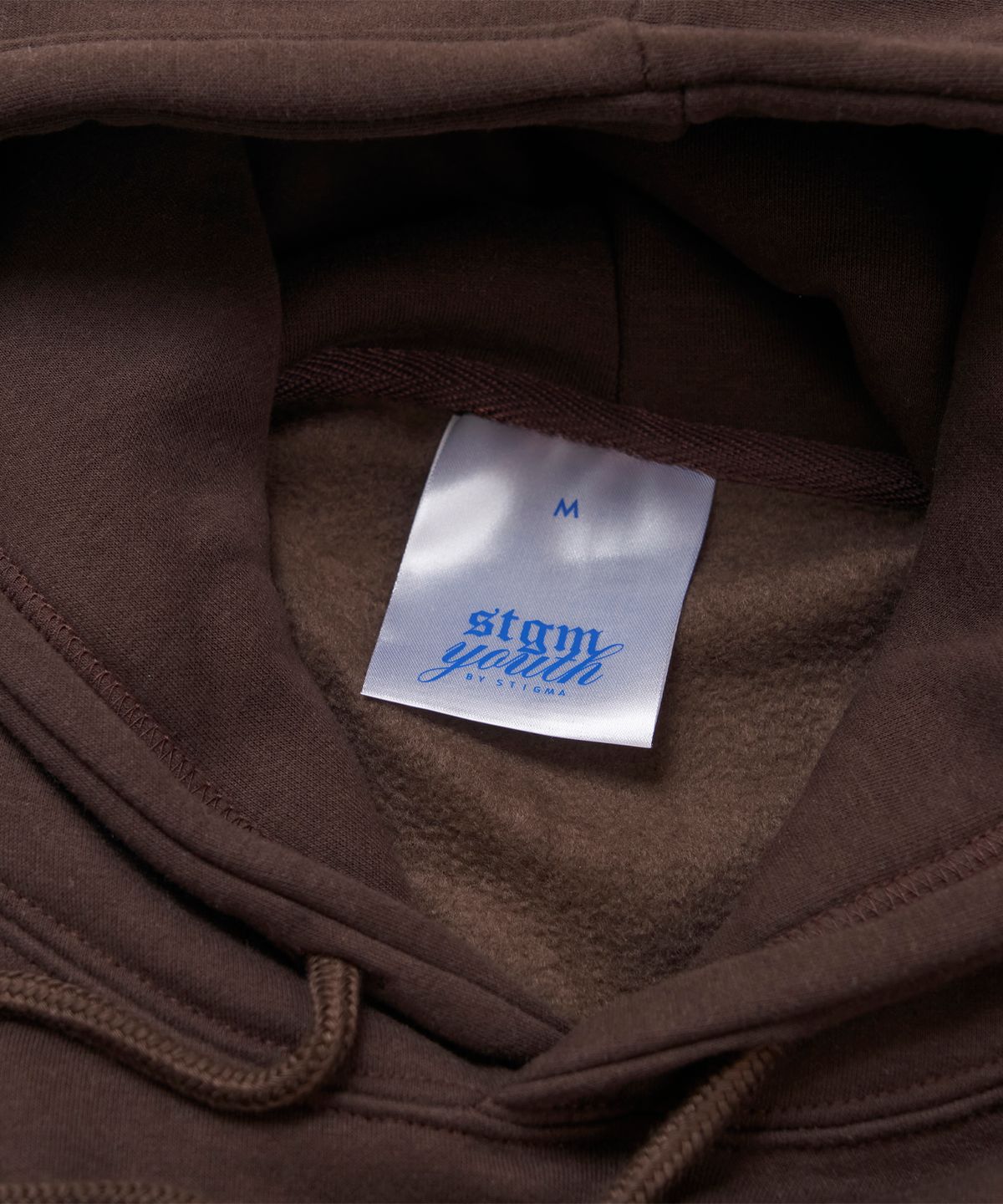 스티그마(STIGMA) [STGM youth] TAG HOODIE BRN