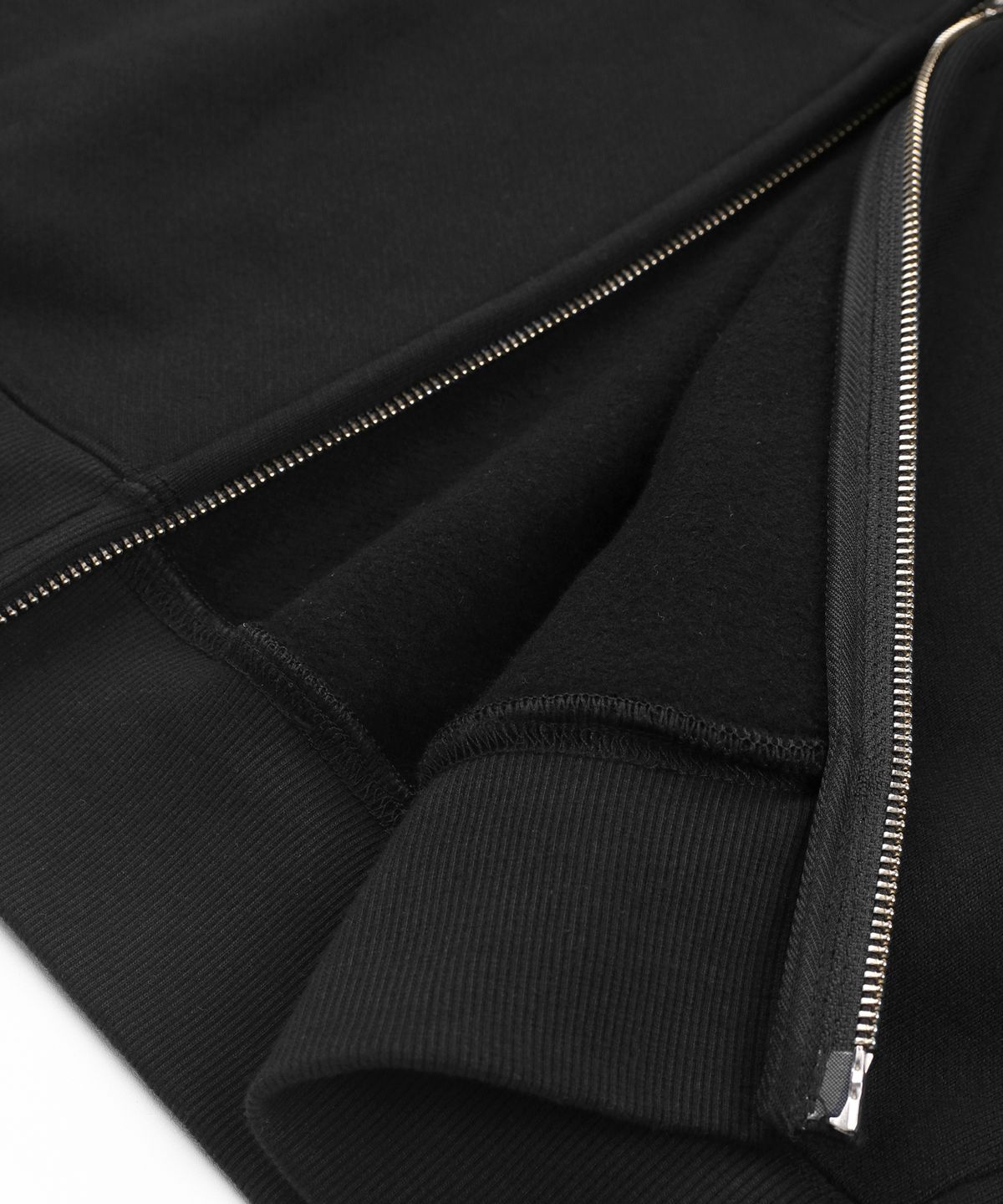 언노운컴노멀(UNKNOWNCOMENORMAL) Symbol Crystal HD Zip Up [BLACK]