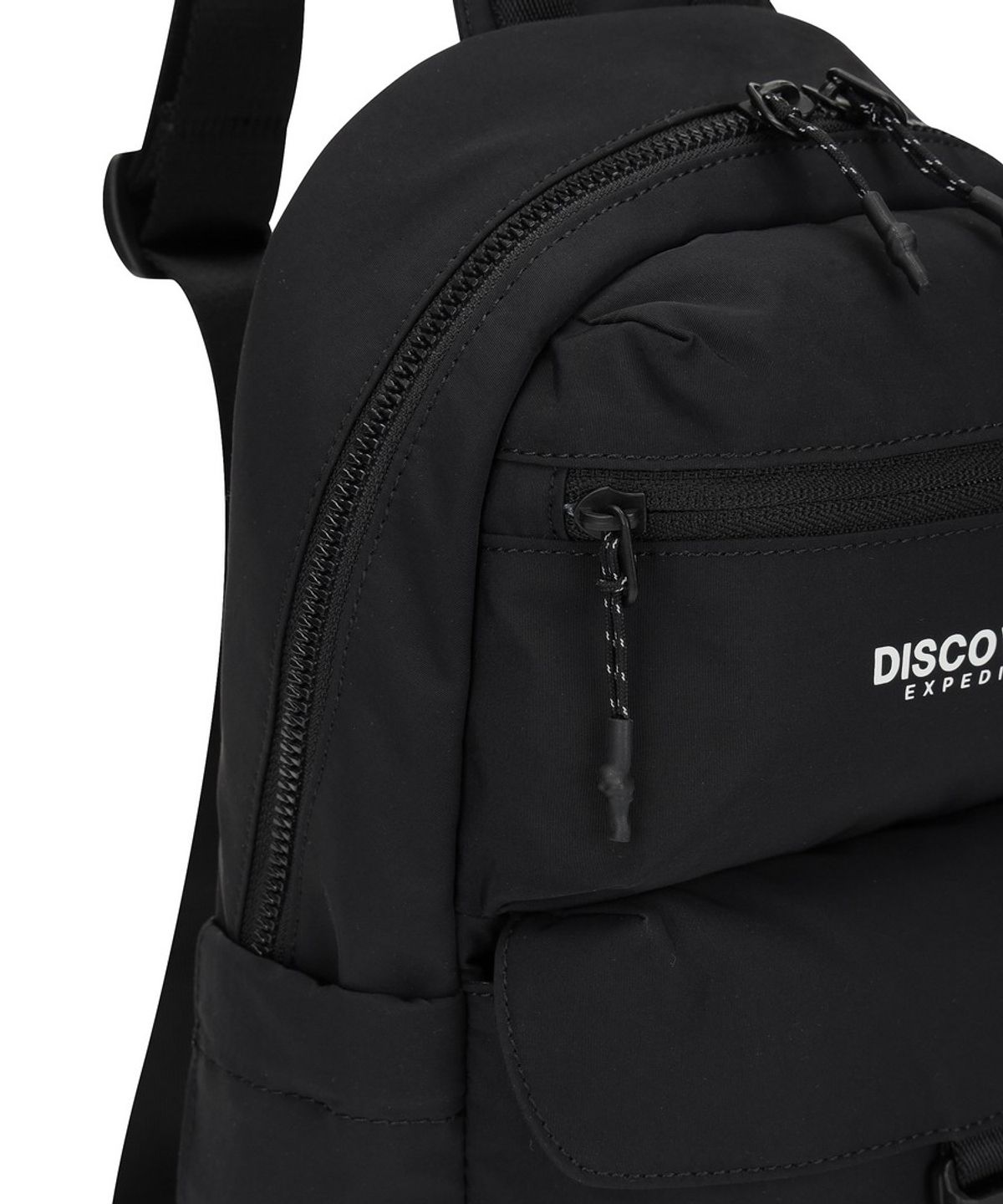 디스커버리 익스페디션(DISCOVERY EXPEDITION) 리플렉스 포켓 슬링백 (BLACK)