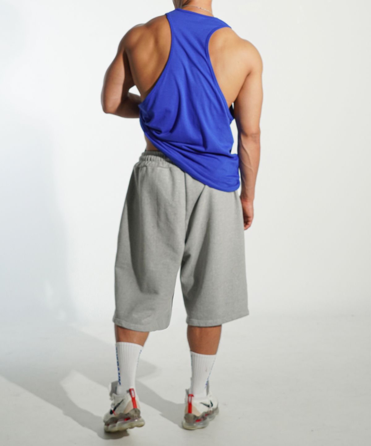 더랭크(THERANK) THRN STANDARD ARCH SLEEVELESS [BULE]
