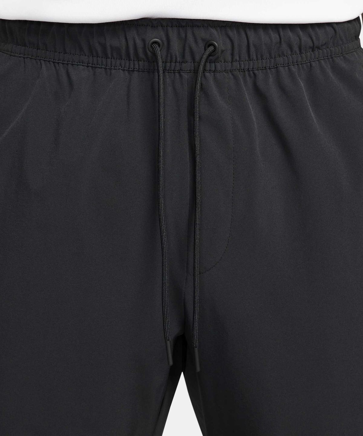 나이키(NIKE) 드라이 핏 언리미티드 테이퍼드 레그 다용도 팬츠 M - 블랙 / FB7549-010