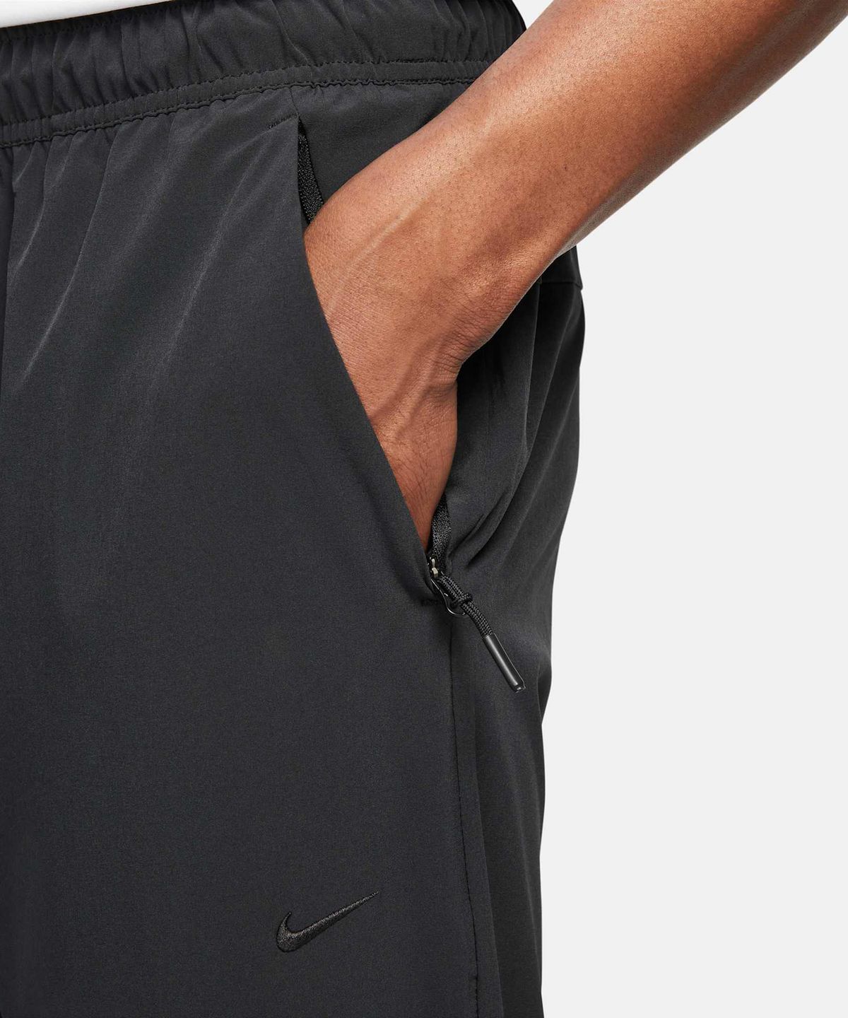 나이키(NIKE) 드라이 핏 언리미티드 테이퍼드 레그 다용도 팬츠 M - 블랙 / FB7549-010