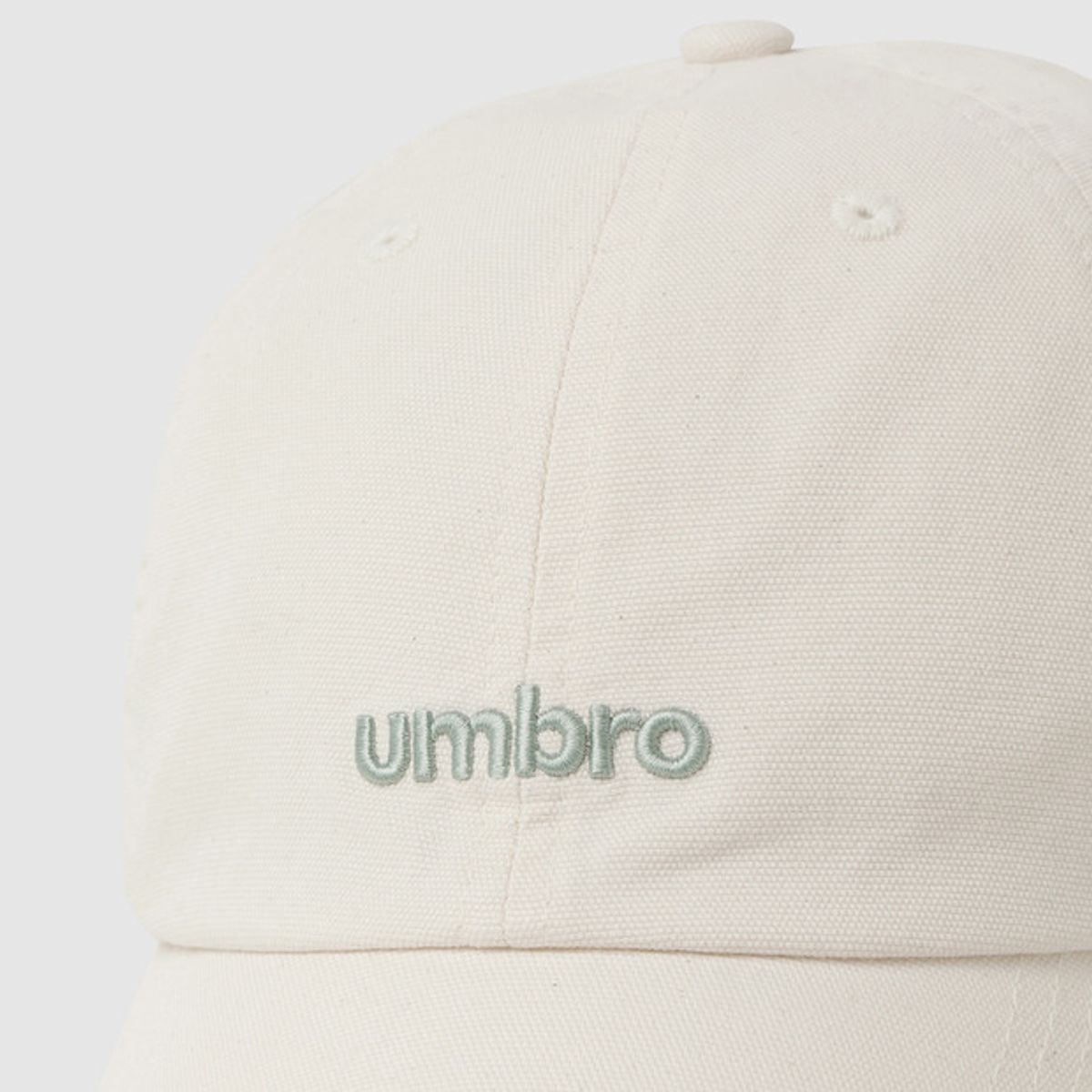 엄브로(UMBRO) 라운드 레터 볼캡 아이보리 UR122CCP15