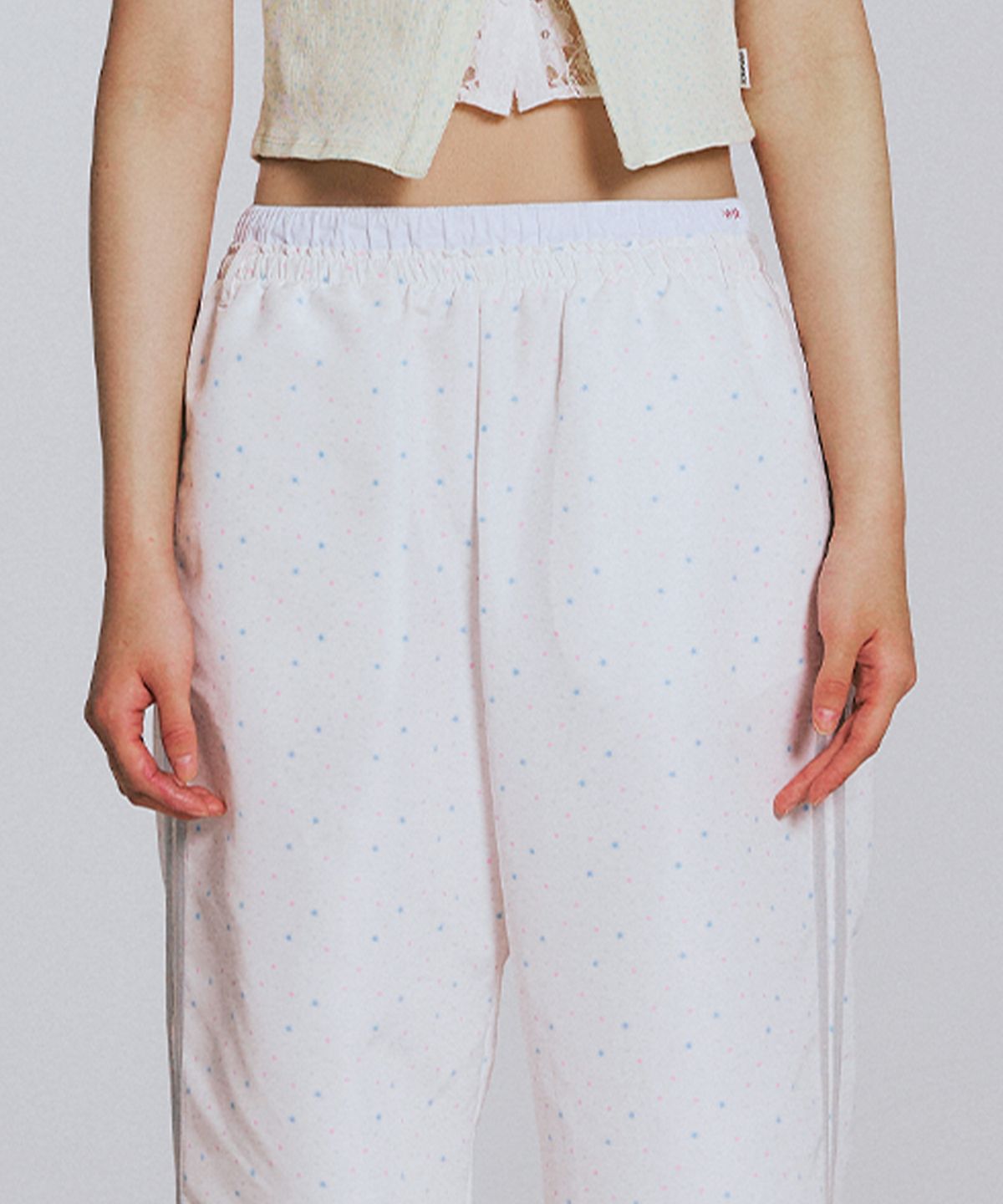 유희(YOUHEE) STAR PATTERN LAYERED BANDING TRACK PANTS_WHITE