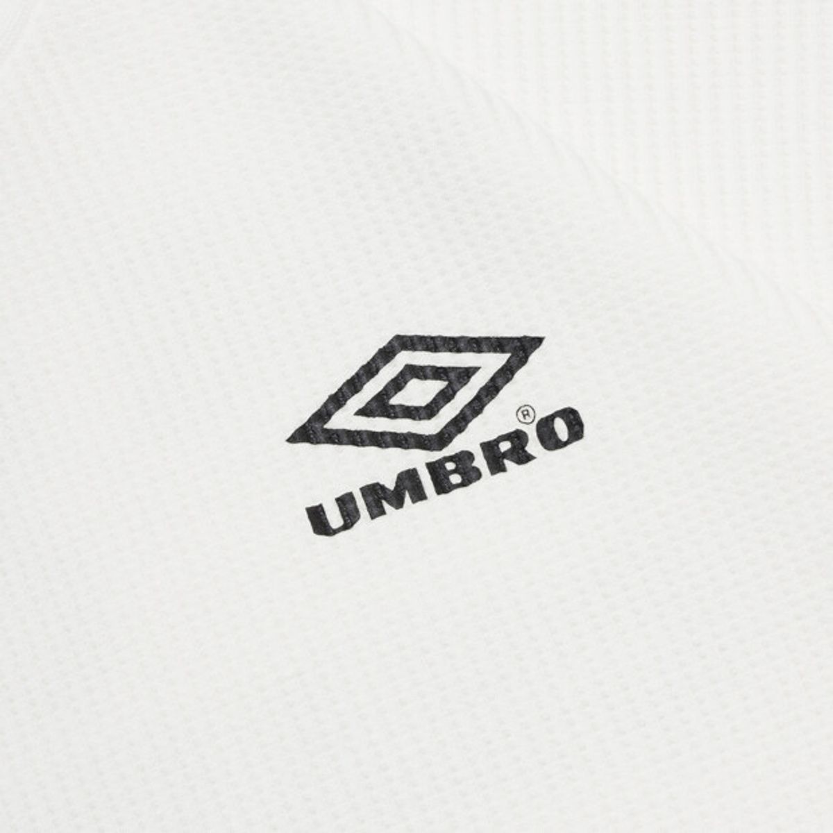 엄브로(UMBRO) 헤리티지 레터링 와플 긴팔 티셔츠 아이보리 UR121CRL21