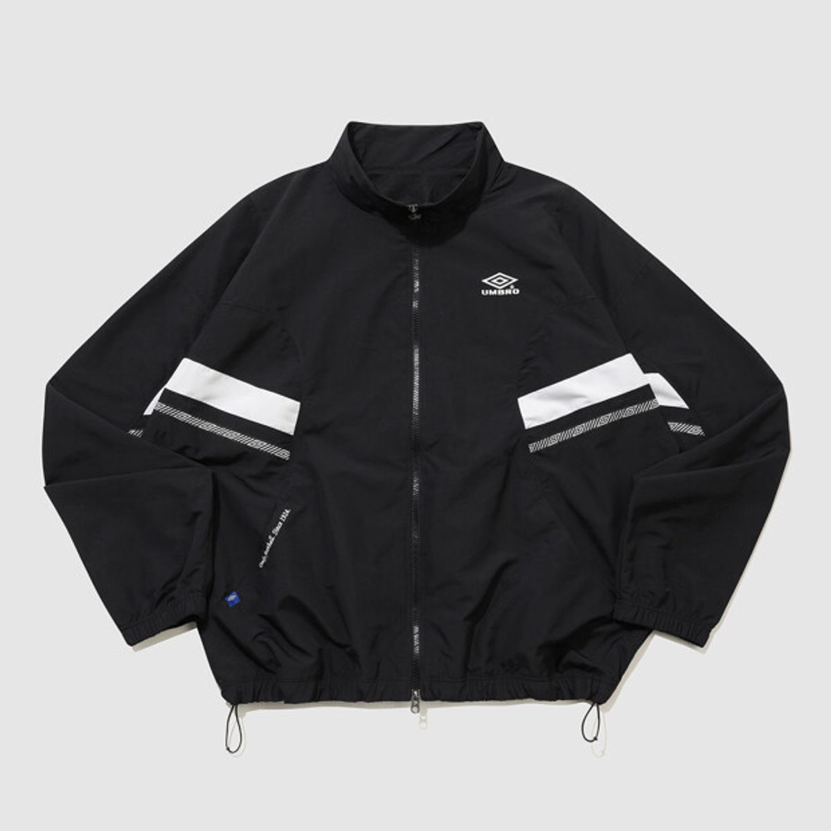 엄브로(UMBRO) 헤리티지 트랙 우븐 바람막이 자켓 블랙 UR121CJK13