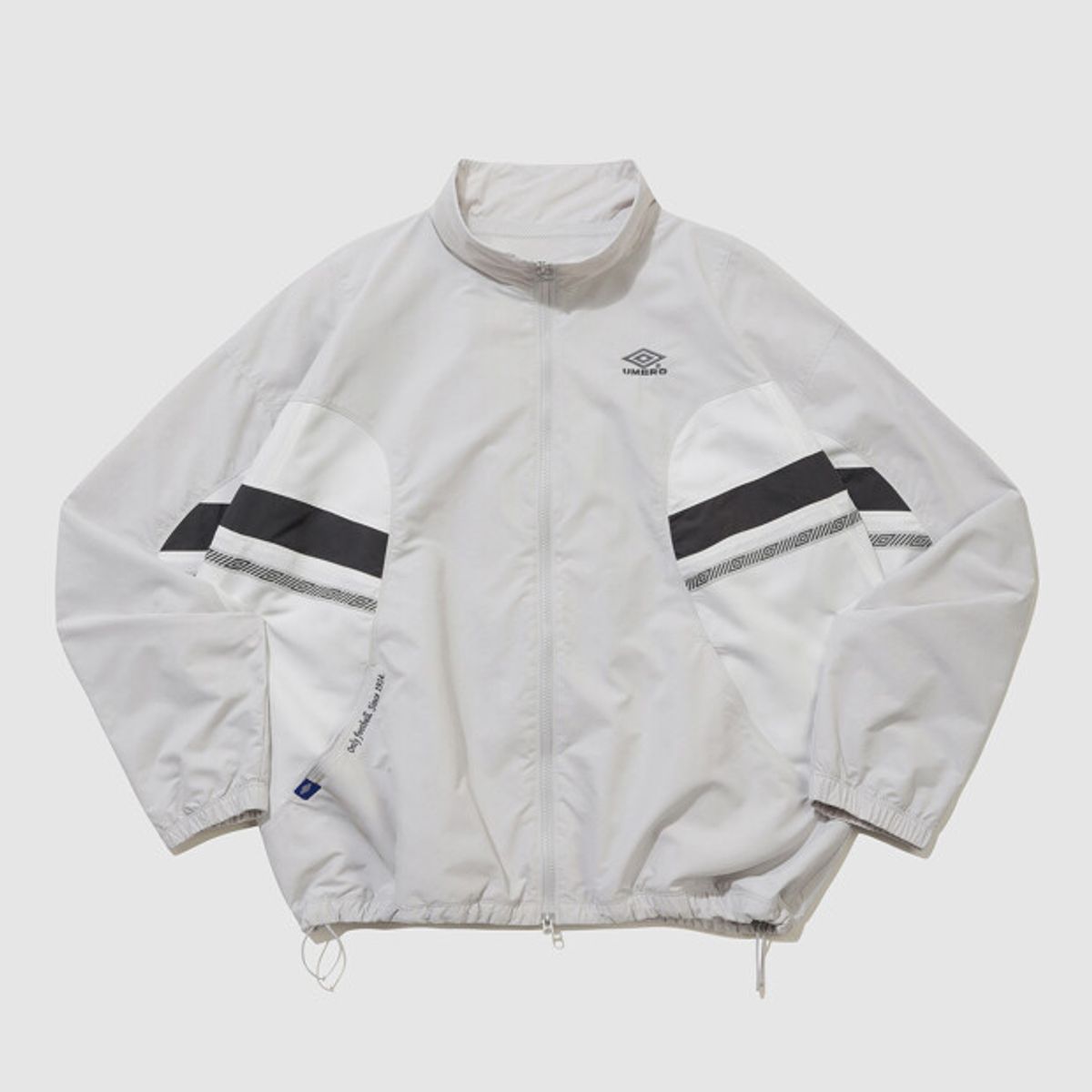 엄브로(UMBRO) 헤리티지 트랙 우븐 바람막이 자켓 그레이 UR121CJK13