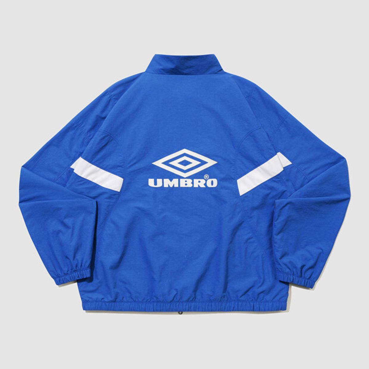 엄브로(UMBRO) 헤리티지 트랙 우븐 바람막이 자켓 블루 UR121CJK13