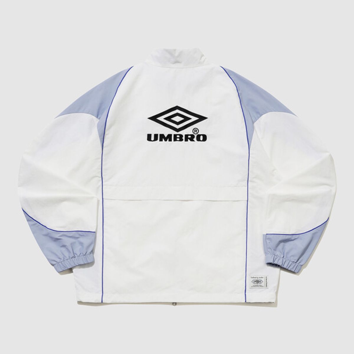 엄브로(UMBRO) HBL 네오 브릿 컬러블럭 스탠넥 바람막이 자켓 아이보리 UR121CJK22
