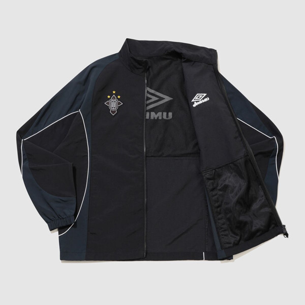 엄브로(UMBRO) HBL 네오 브릿 컬러블럭 스탠넥 바람막이 자켓 블랙 UR121CJK22