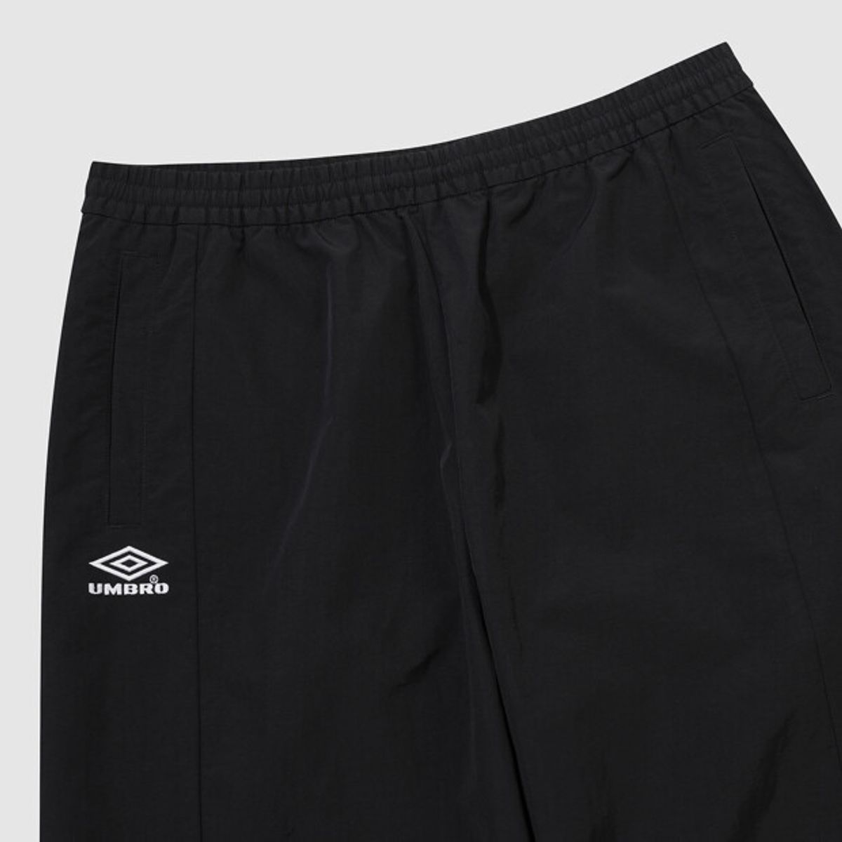 엄브로(UMBRO) HBL 브릿 캐주얼 컬러블록 와이드 조거 2WAY 셋업 팬츠 블랙 UR121CPT24
