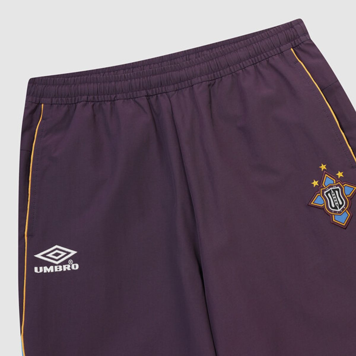 엄브로(UMBRO) HBL 네오 브릿 컬러블록 와이드 조거 2WAY 셋업 팬츠 퍼플 UR123CPT22