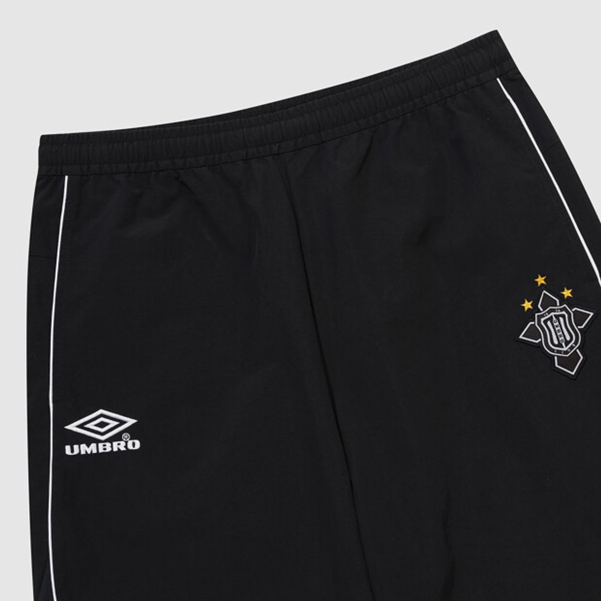 엄브로(UMBRO) HBL 네오 브릿 컬러블록 와이드 조거 2WAY 셋업 팬츠 블랙 UR123CPT22