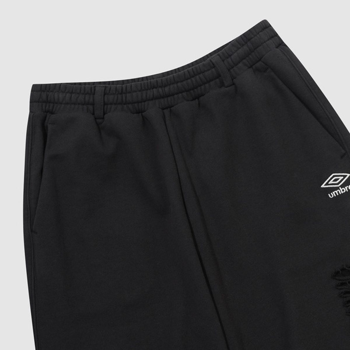 엄브로(UMBRO) 우먼스 데미지 스웨트 팬츠 블랙 UR122CFP13