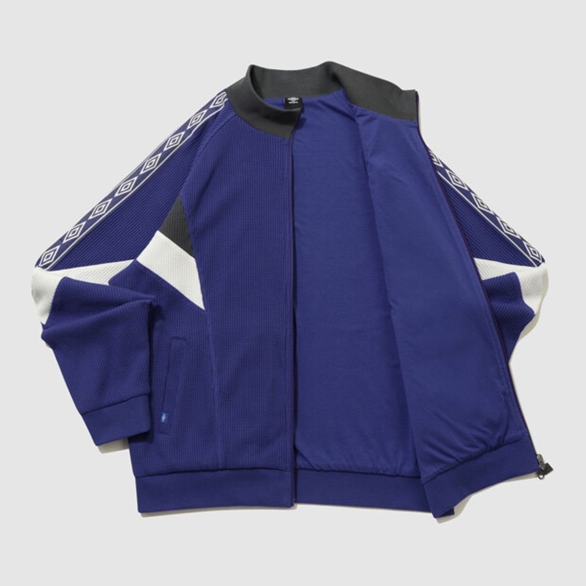 엄브로(UMBRO) 컬러블럭 와플 트랙 자켓 블루 UR124CFT11