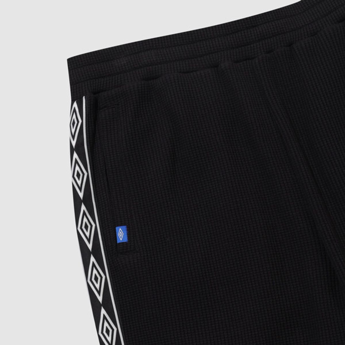 엄브로(UMBRO) 와플 와이드 조거 2WAY 트랙 팬츠 블랙 UR123CFP11