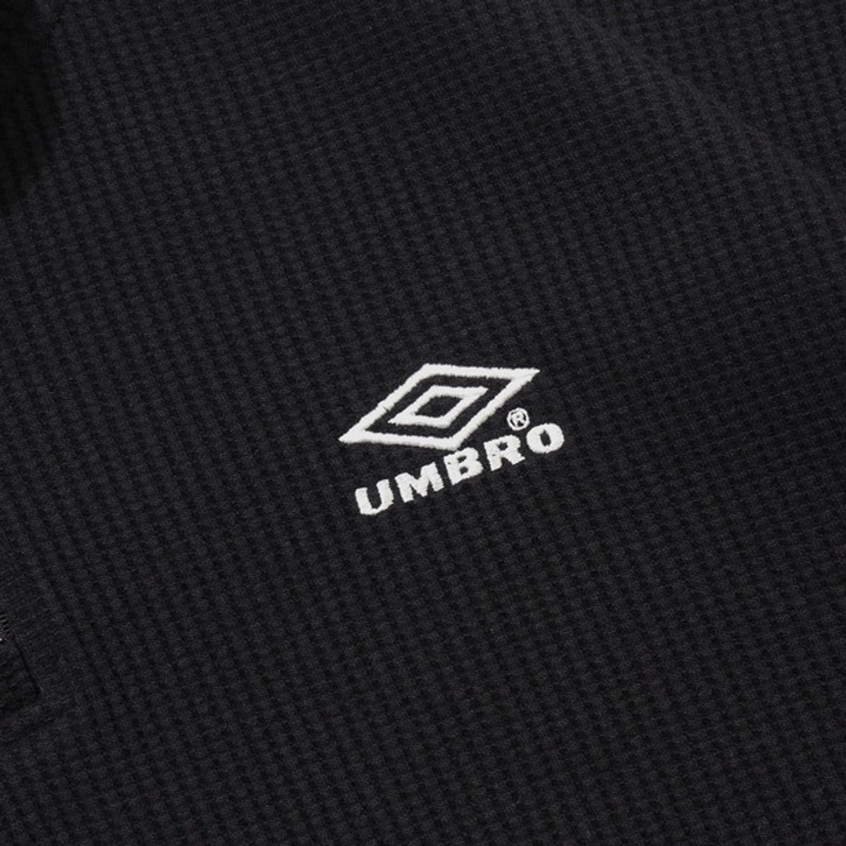 엄브로(UMBRO) 와플 우먼스 트랙 하프집업 블랙 UR122CFS11