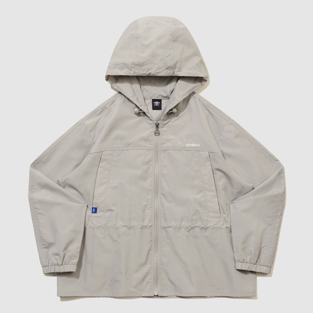 엄브로(UMBRO) 우먼스 트랙 후드 바람막이 자켓 베이지 UR122CJK12