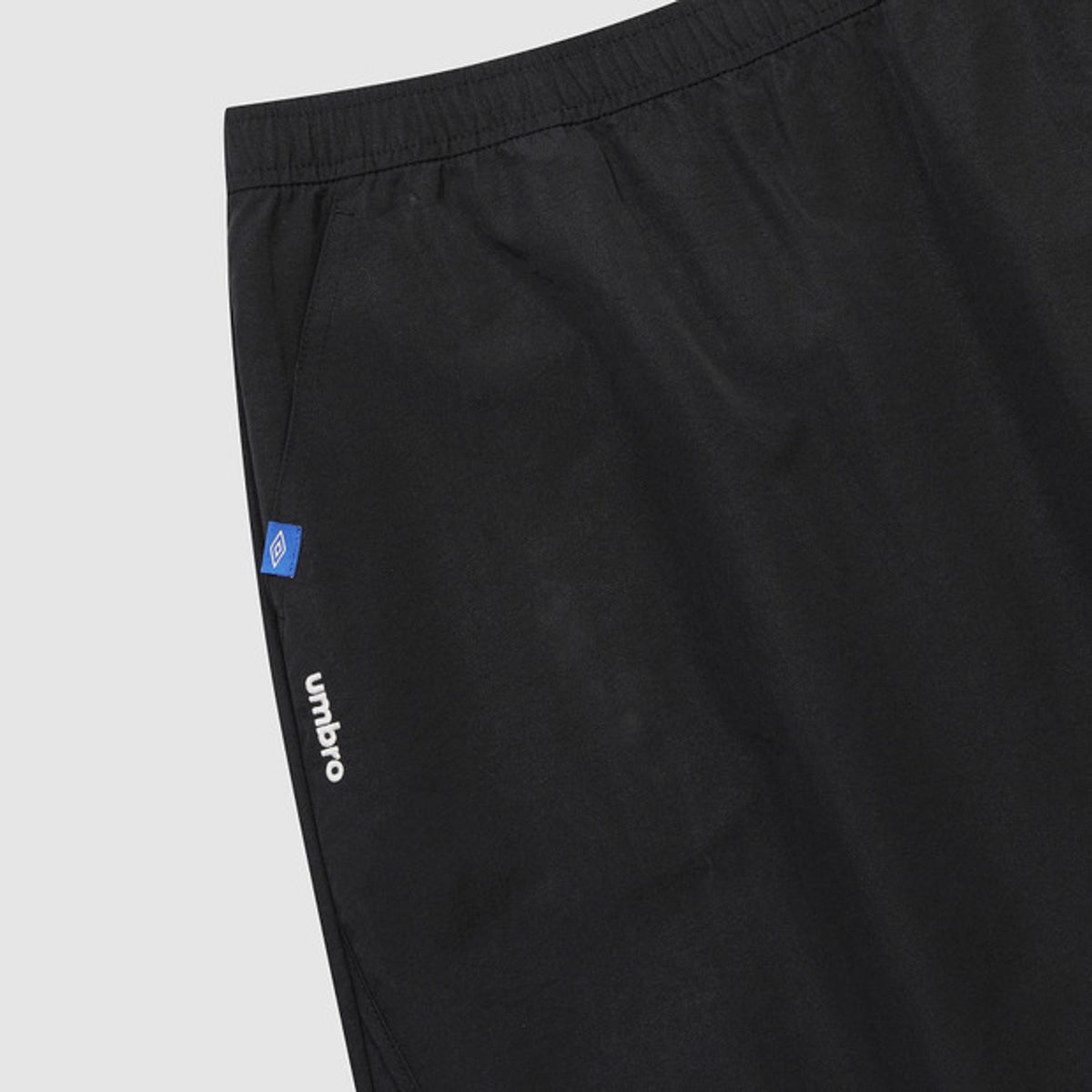 엄브로(UMBRO) 우먼스 트랙 우븐 롱스커트 블랙 UR122CSK11
