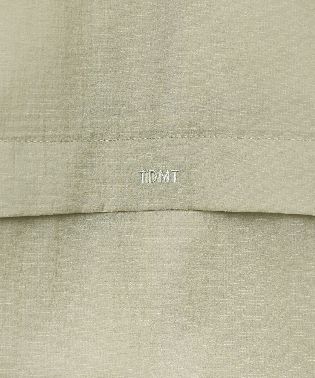 튜드먼트(TTUDEMENT) SHEER FRILLED WINDBREAKER_KHAKI