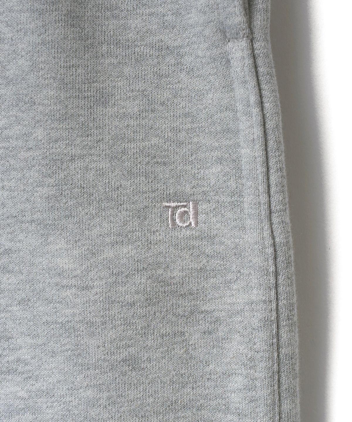 튜드먼트(TTUDEMENT) TT LOGO SWEATPANTS_MELANGE GREY