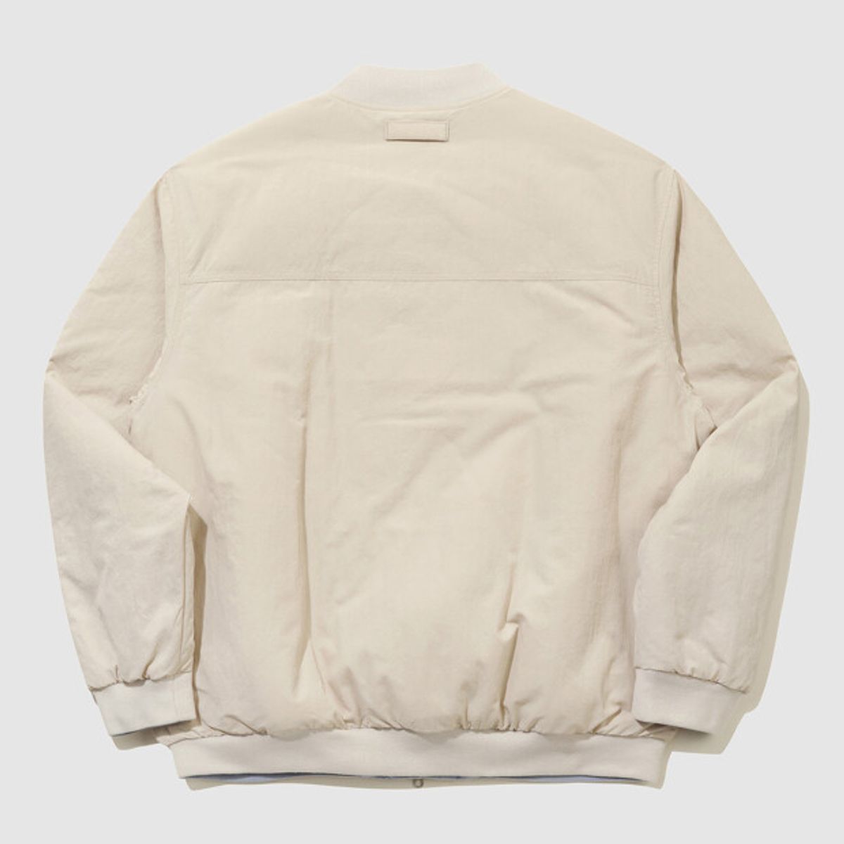 엄브로(UMBRO) 리버시블 봄버 패딩 자켓 아이보리 UR124CPJ21