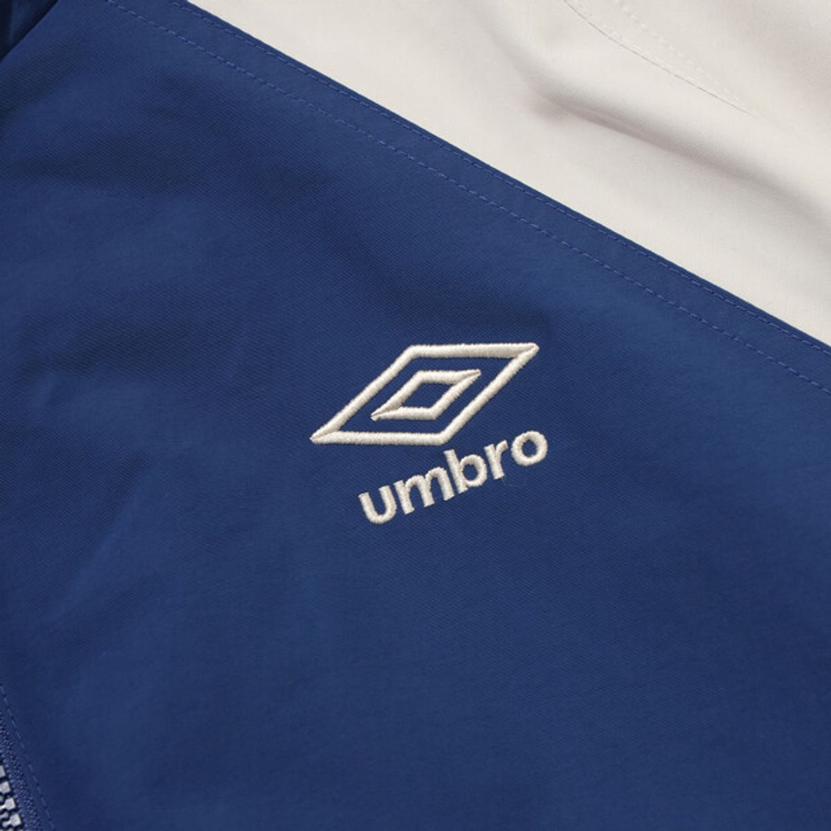 엄브로(UMBRO) 팝러쉬 기모 바람막이 자켓 블루 UR123CJK14