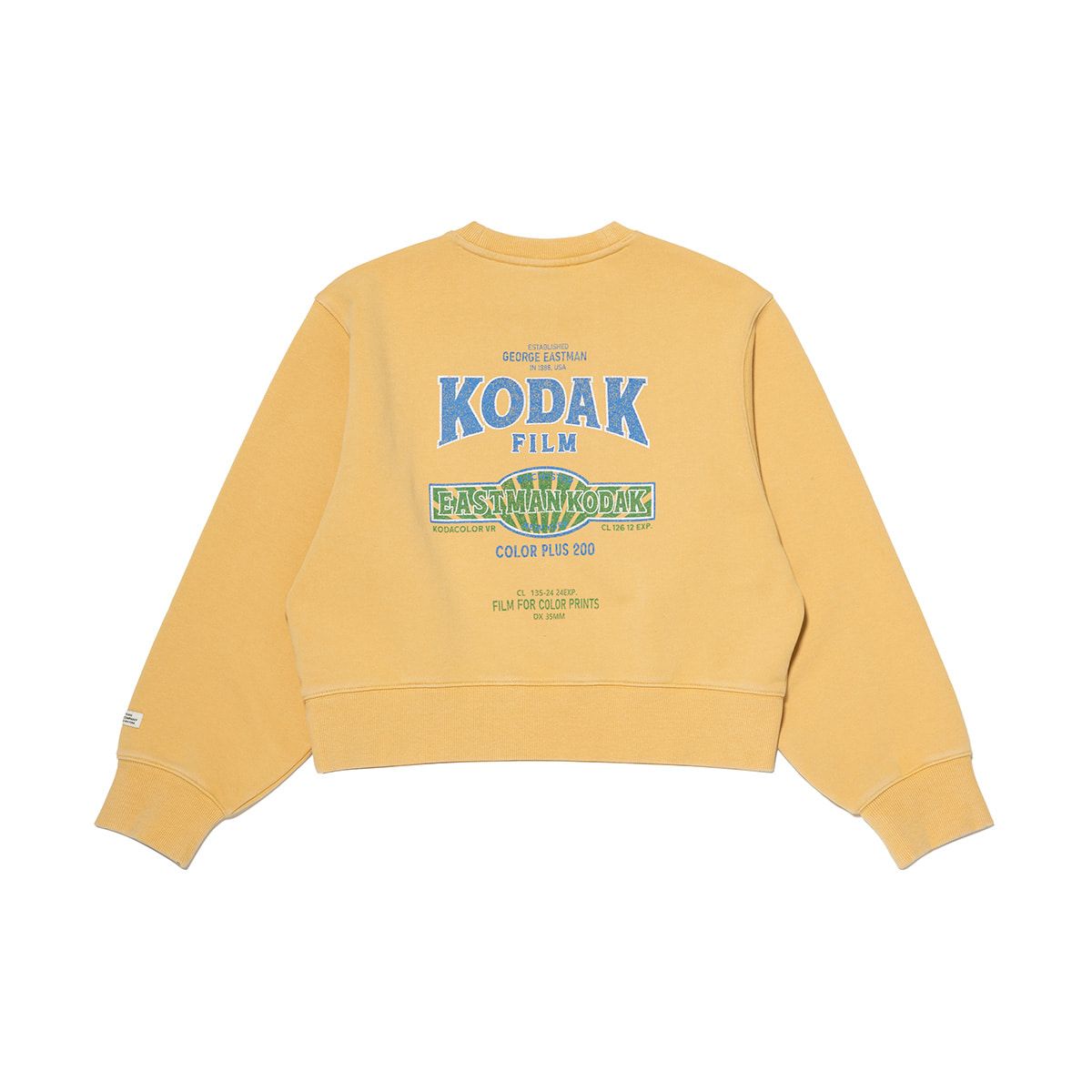 코닥(KODAK) 스노우 워싱 그래픽 맨투맨 우먼 YELLOW