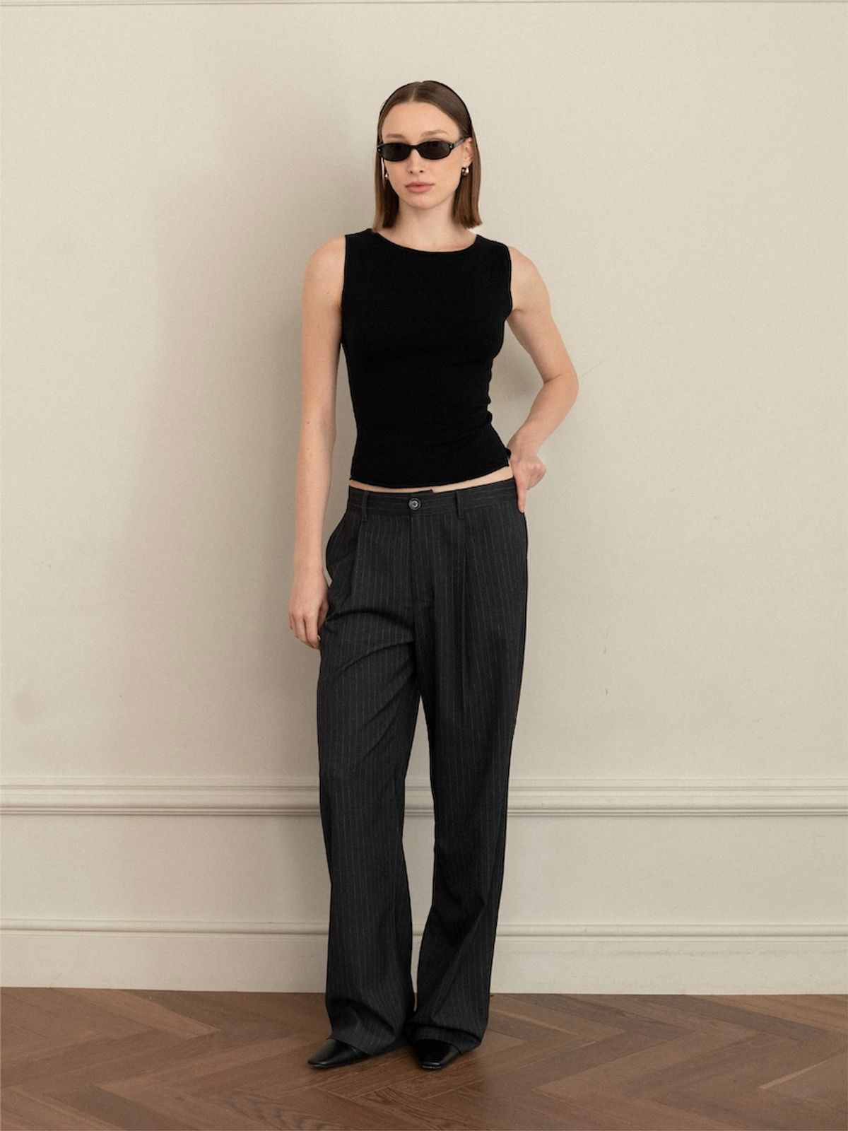 글로니(GLOWNY) G KNIT SLIT SLEEVELESS TOP (BLACK)