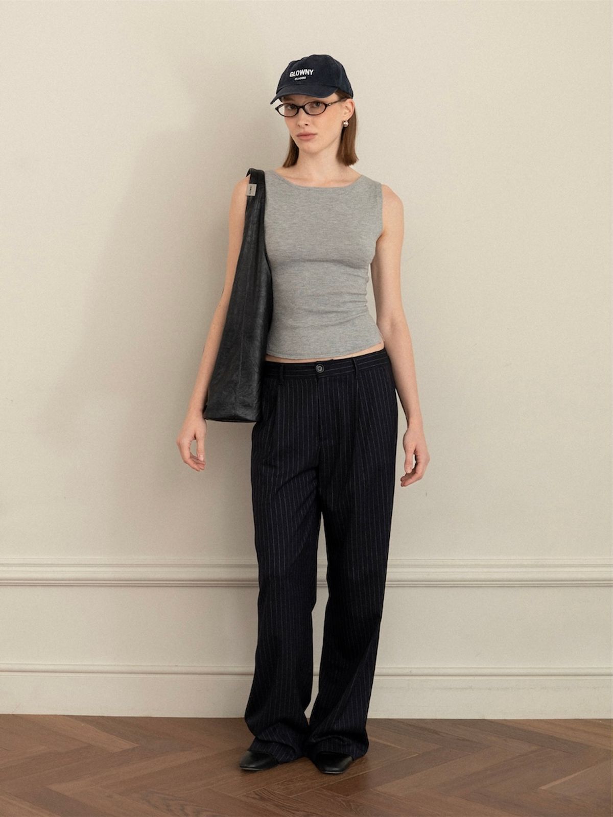 글로니(GLOWNY) G KNIT SLIT SLEEVELESS TOP (MELANGE GRAY)