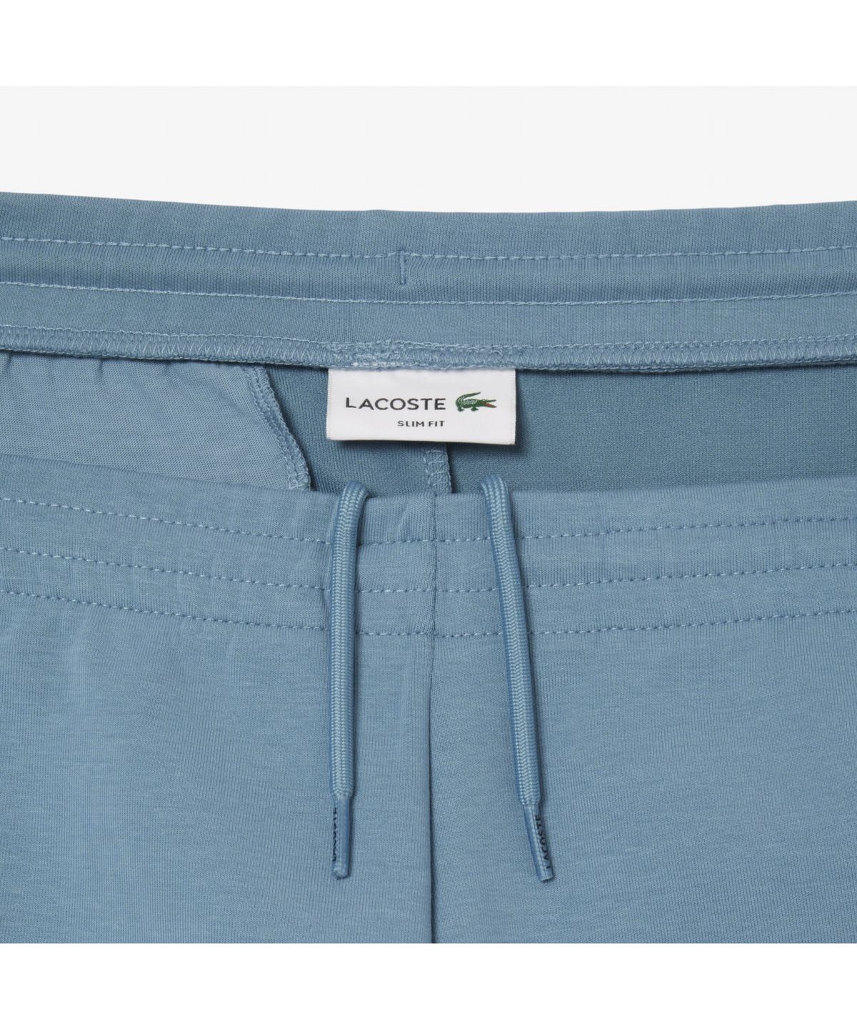라코스테(LACOSTE) 남성 슬림핏 더블페이스 조거 팬츠 XH9583-55G HD9