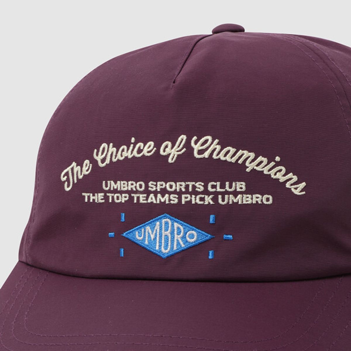 엄브로(UMBRO) 레터 그래픽 반평챙캡 퍼플 UR123CCP31