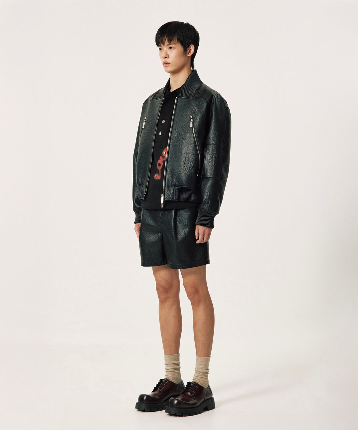 엠티더블유(MTW) 러브클럽 네온 페이크 레더 블랙 점퍼