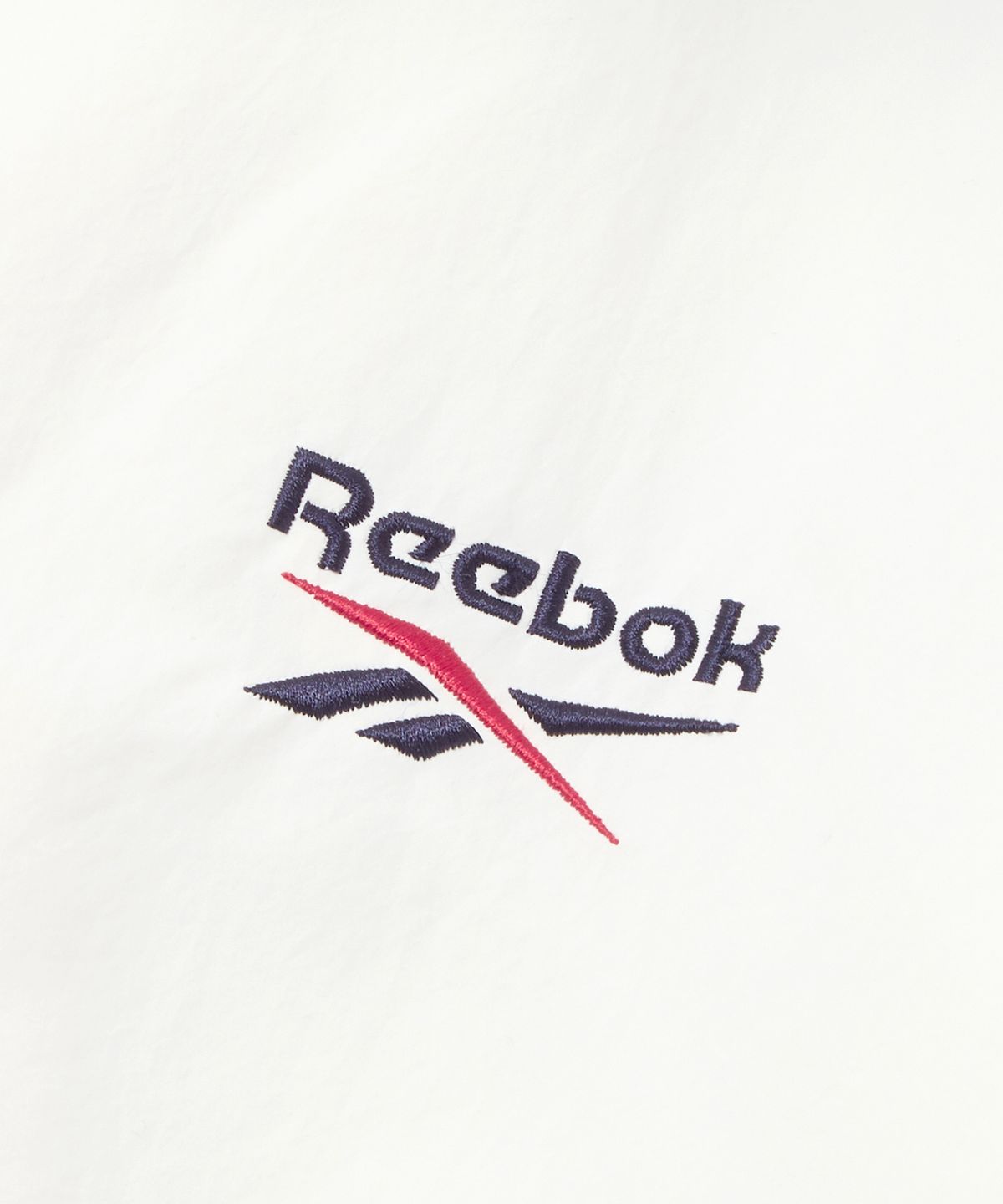 리복(REEBOK) 레전드 트랙 패딩 자켓 - 화이트