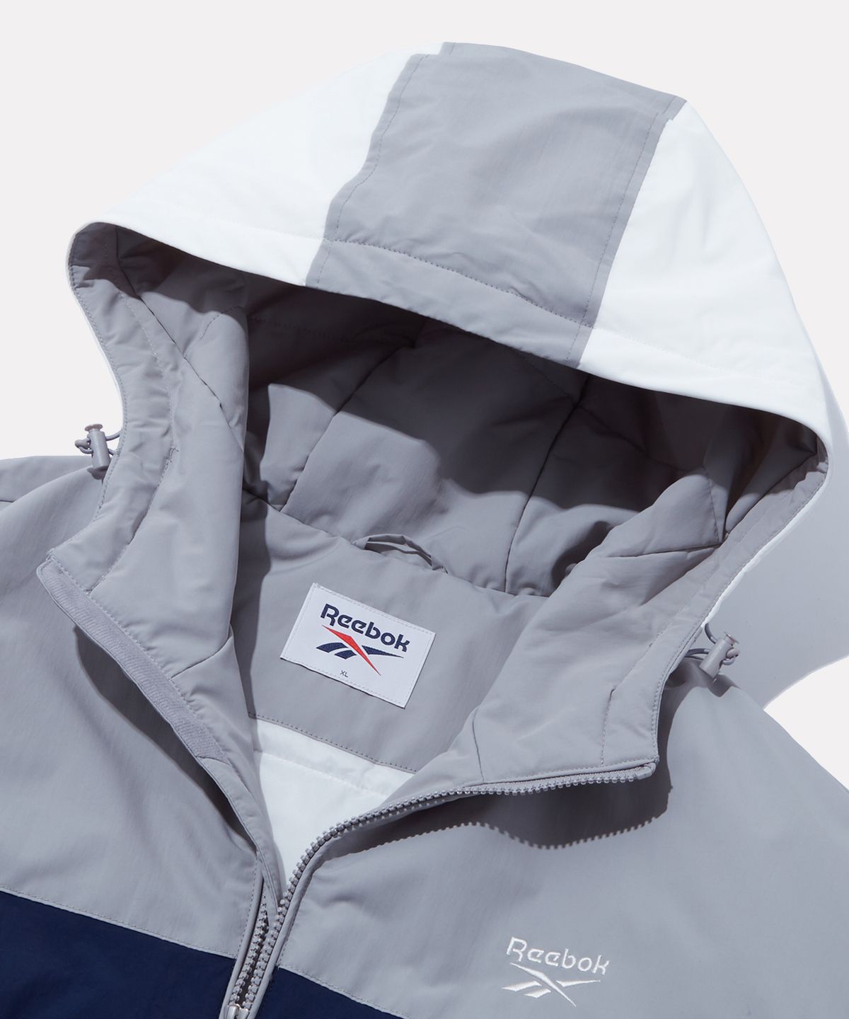 리복(REEBOK) 스포티 컬러블럭 패딩 자켓 - 라이트 그레이