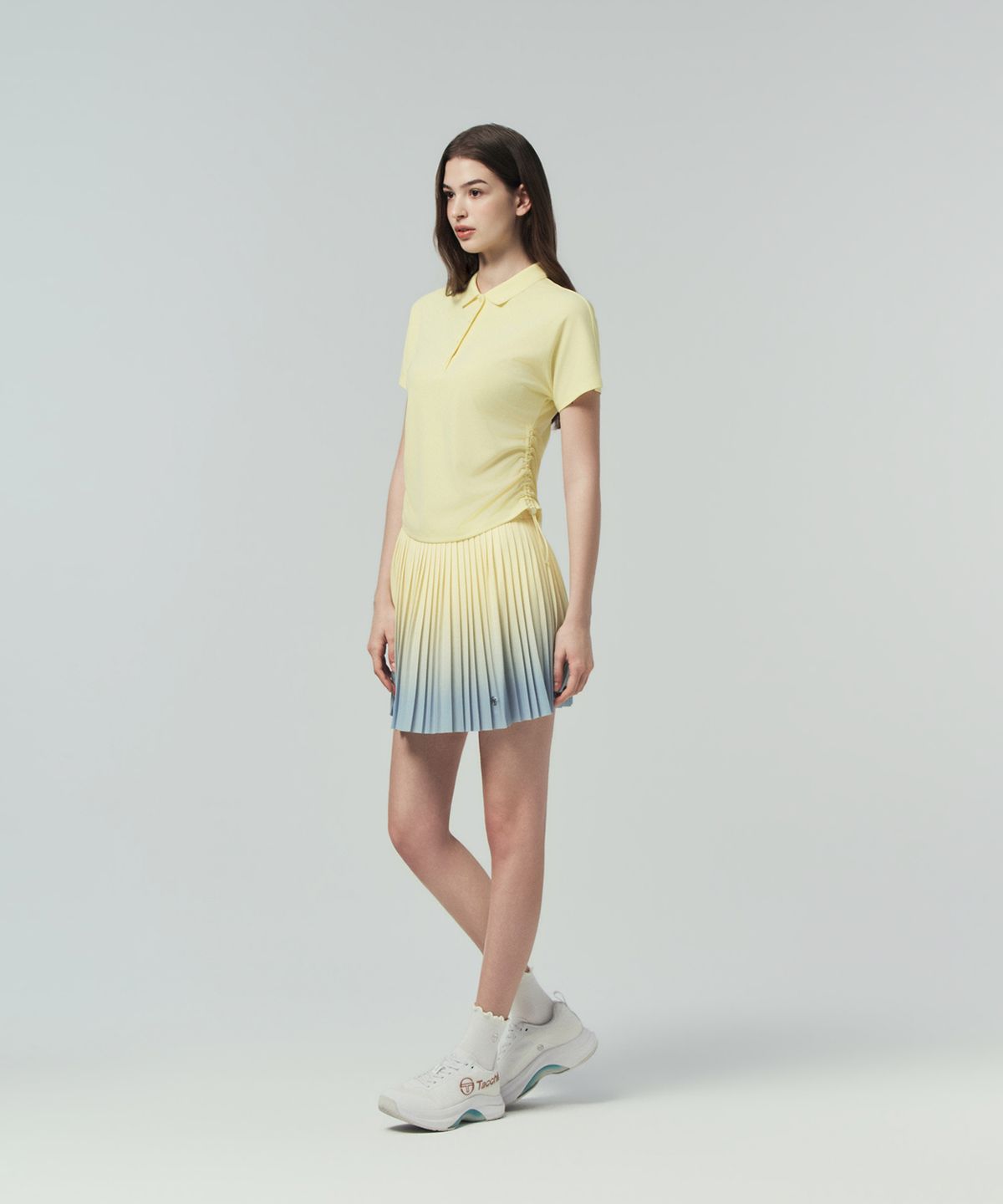 세르지오 타키니(SERGIO TACCHINI) W 타키니 플라잉 잔플리츠 스커트 (Ptn.Yellow)