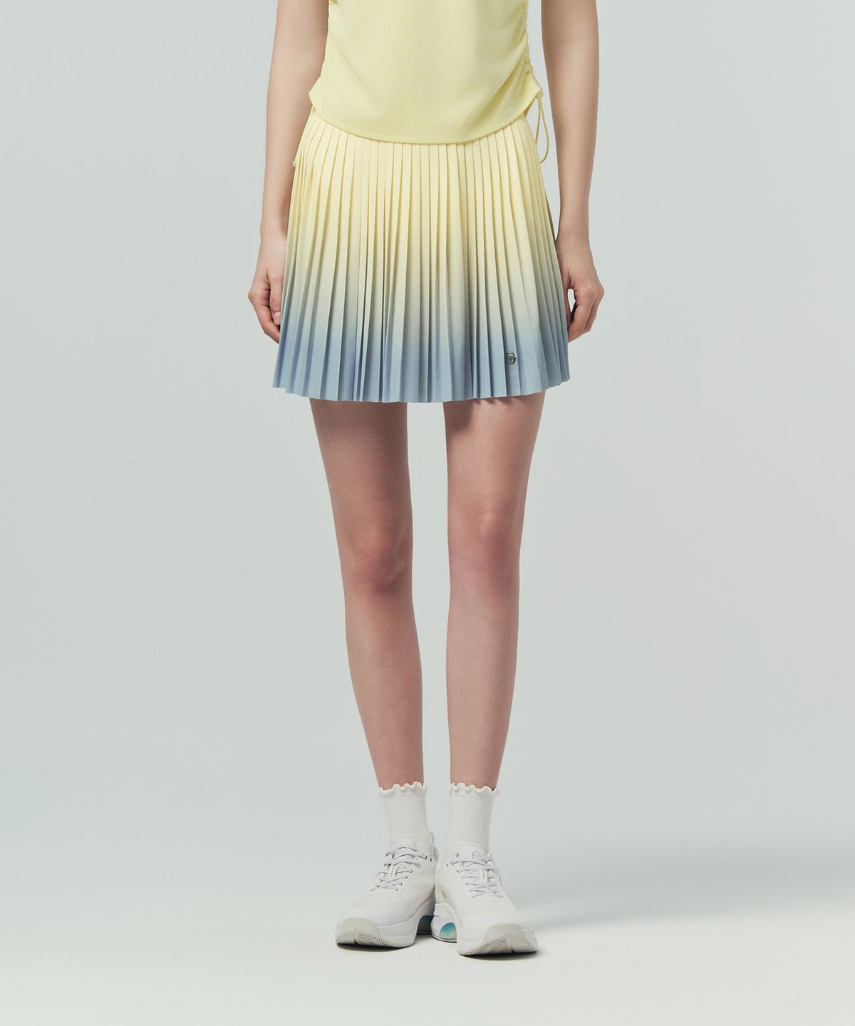 세르지오 타키니(SERGIO TACCHINI) W 타키니 플라잉 잔플리츠 스커트 (Ptn.Yellow)