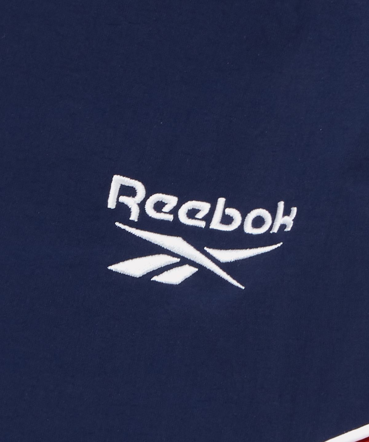 리복(REEBOK) 헤리티지 윈드 브레이커 v26 (W) - 네이비:레드