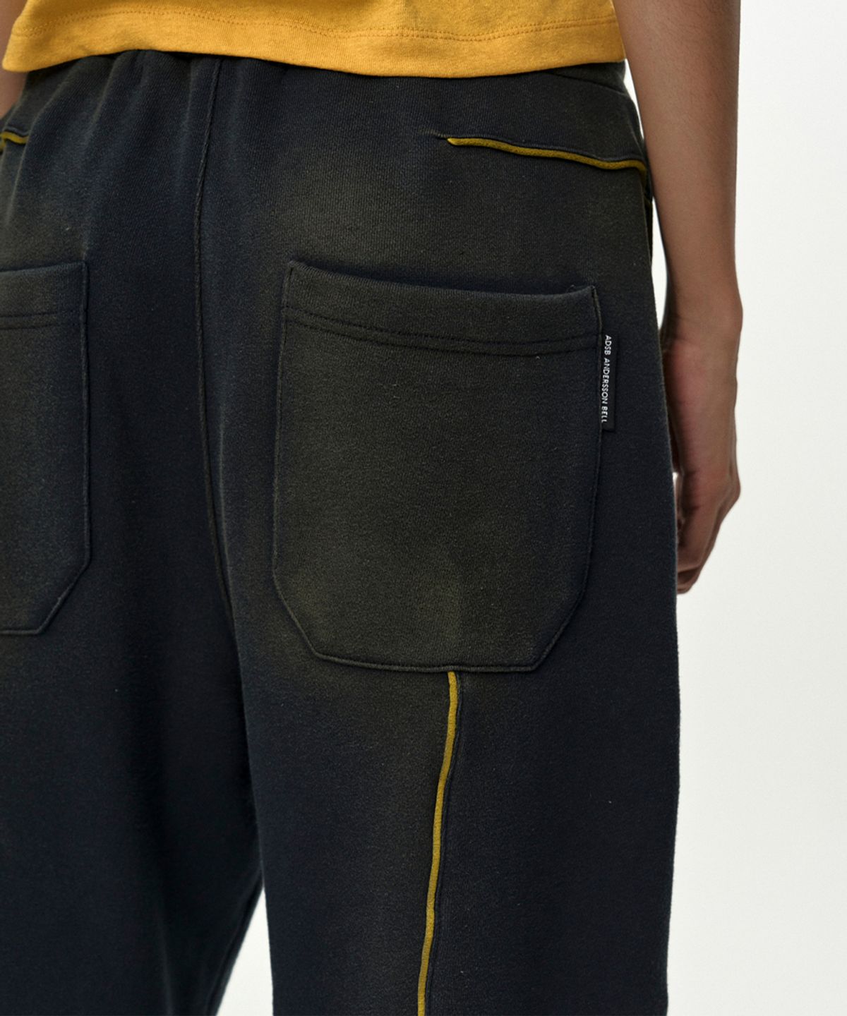 앤더슨벨(ADSB ANDERSSON BELL) UNISEX PIPING LINE DYED SWEAT PANTS apa875u(NAVY)
