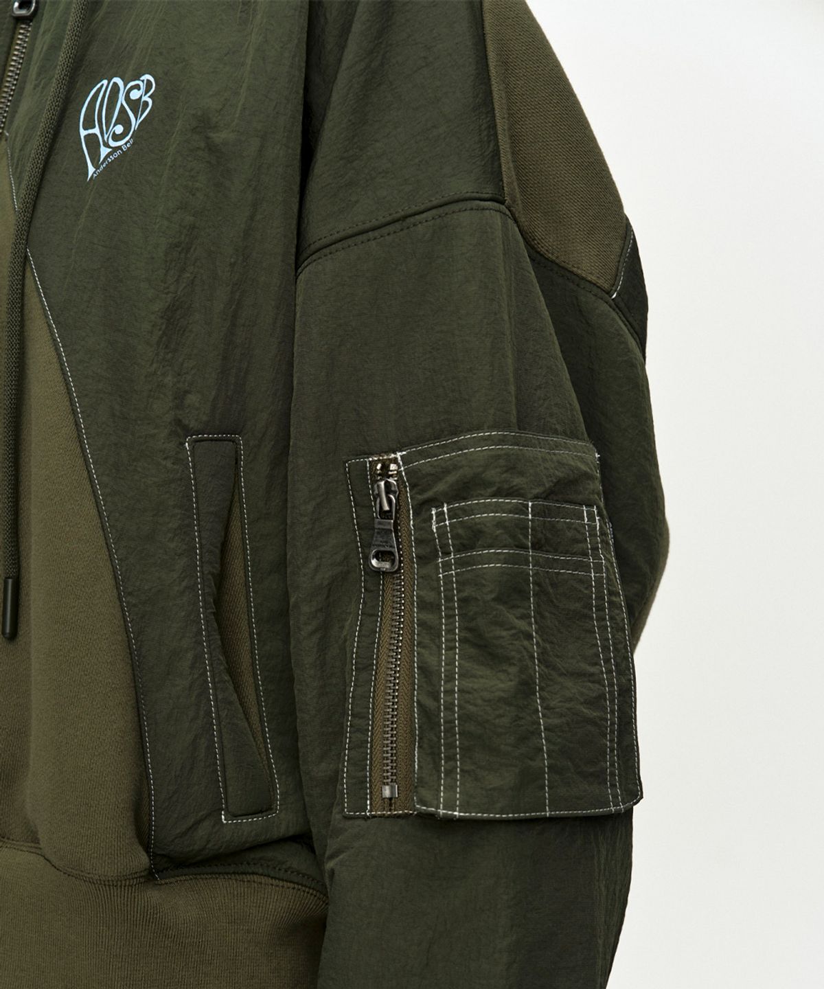 앤더슨벨(ADSB ANDERSSON BELL) PATCHWORK MA-1 HOODIE ZIP UP atb1507w(KHAKI)